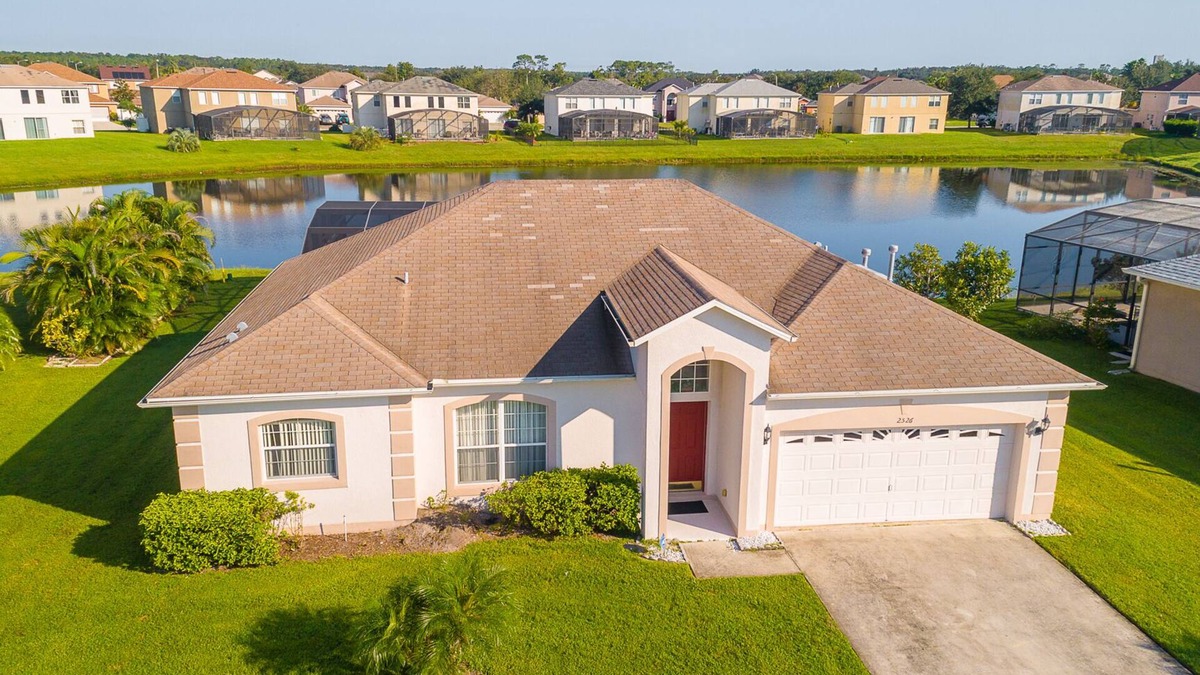 Crescent Lakes House | Near Disney Luxury Lakeside Villa with Spa and Wireless Internet