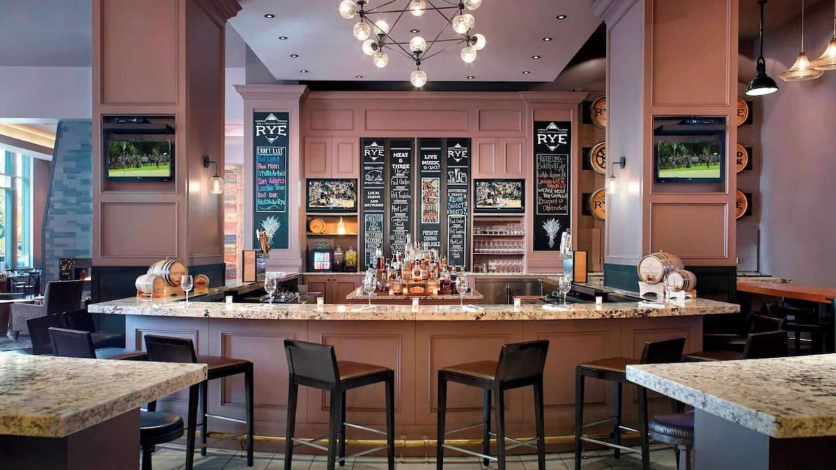 Downtown Hotel | Near Red Hat Amphitheater + Dining. Pool. Gym.