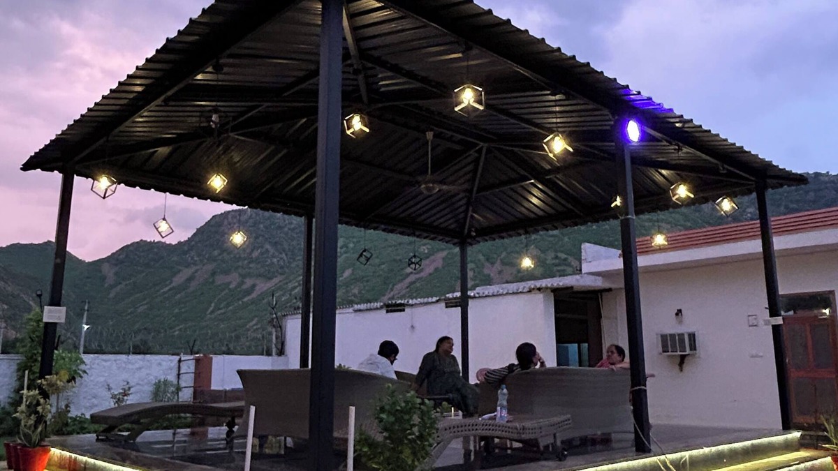 Alwar Other | Nestled amidst majestic mountains, our farmhouse offers a serene and picturesque