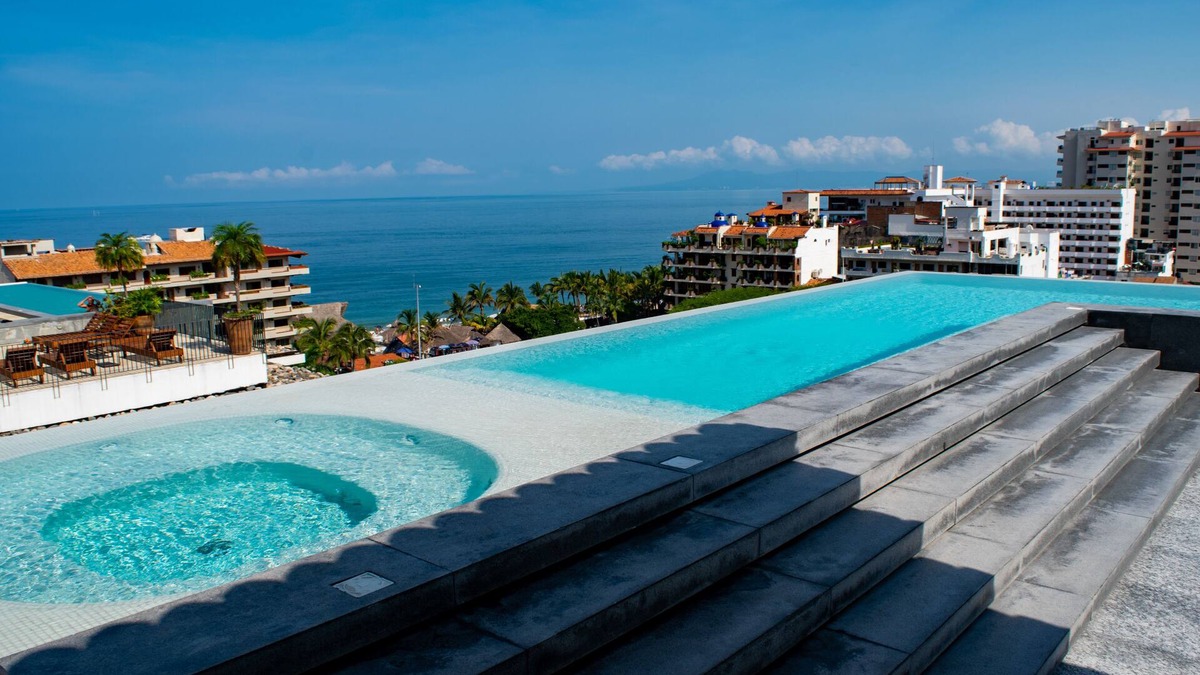 Emiliano Zapata Condo | New 2 BR condo, 5 min to the beach. Amazing ocean views from rooftop with pool!