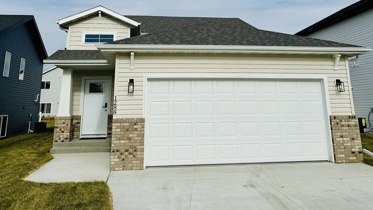 Fargo House | NEW family- friendly 3 bedrm home in West Fargo with space to gather and relax.