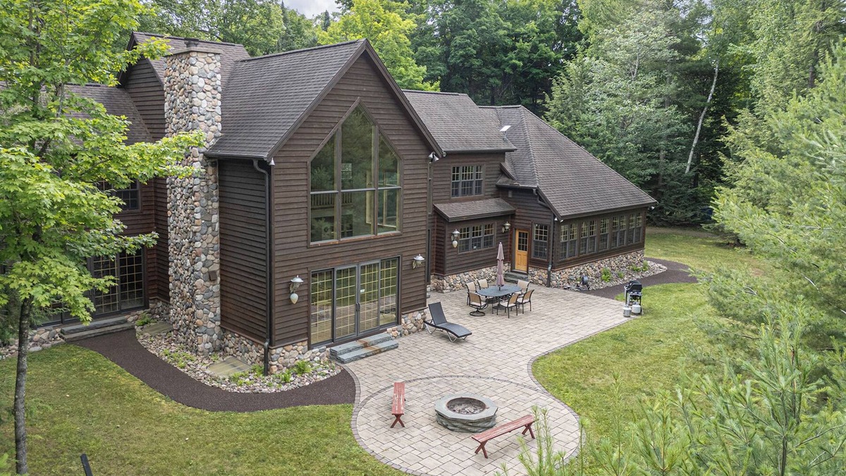 Manitowish Waters House | New Listing! Don’s Bay Estate | Lakefront Luxury with Dock, Trails & Fire Pit