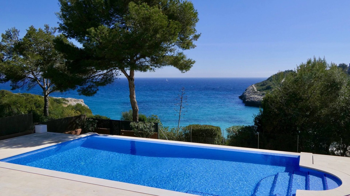 Cala Mandia Villa | New Luxury Villa, 1st Line Sea and Beach, Large Infinity Pool with Whirlpool .