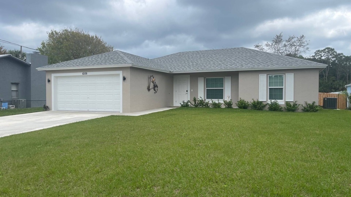 Indian River Estates House | New modern 3-bed 2 bath house with smart TV's in every room, WIFI, and hot tub