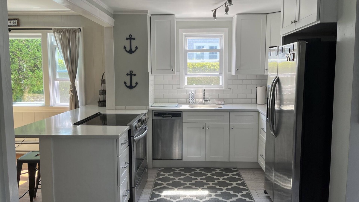 Silver Beach Cottage | New Silver Beach Cottage just a short walk to association beach and harbor!