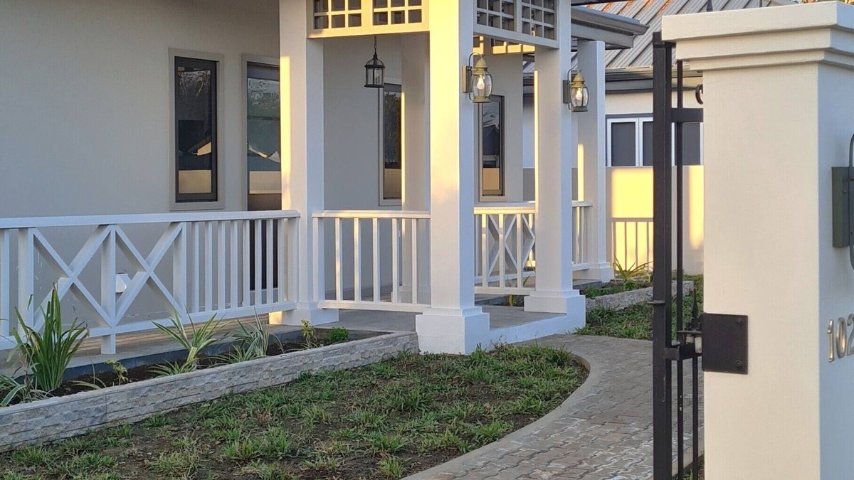 Crown Point Villa | New spacious luxury 4-bedroom villa in gated development close to beaches.