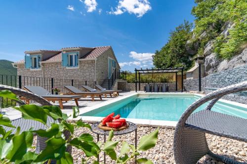 Zadvarje Villa | NEW! Stone villa JUDITA with heated pool and hydro-massage