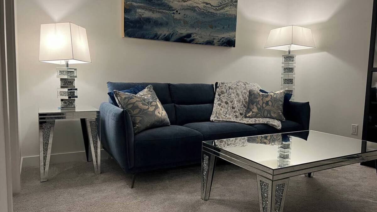 Southeast Calgary Condo | New, stylish suite. Private entrance, queen bed, full kitchen, in-suite laundry.