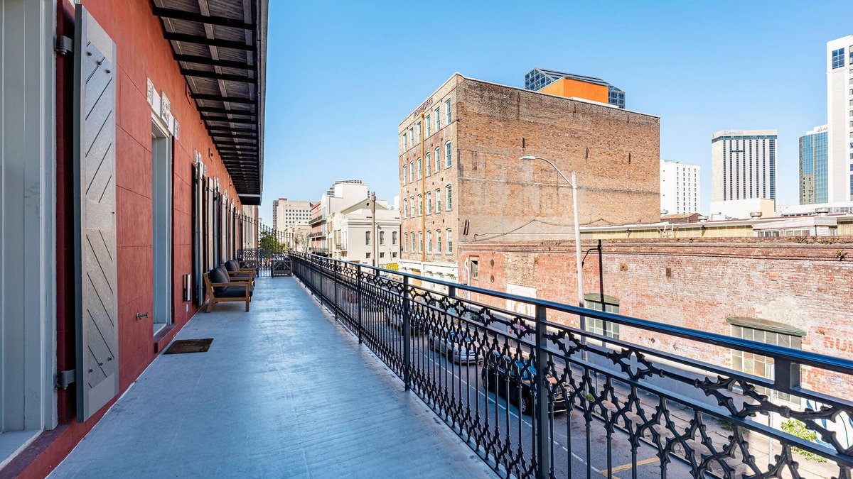 Arts/Warehouse District Condo | 📣New XL Luxury Corner Condo PRIME Historic Downtown Location HUGE Balcony Wrapped in Wrought Iron