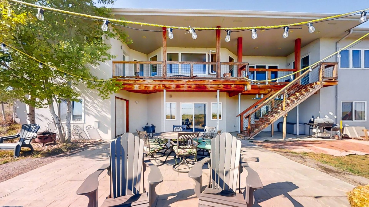 Fort Collins House | Newly built walkout basement with water views, patio, & Ping-Pong table