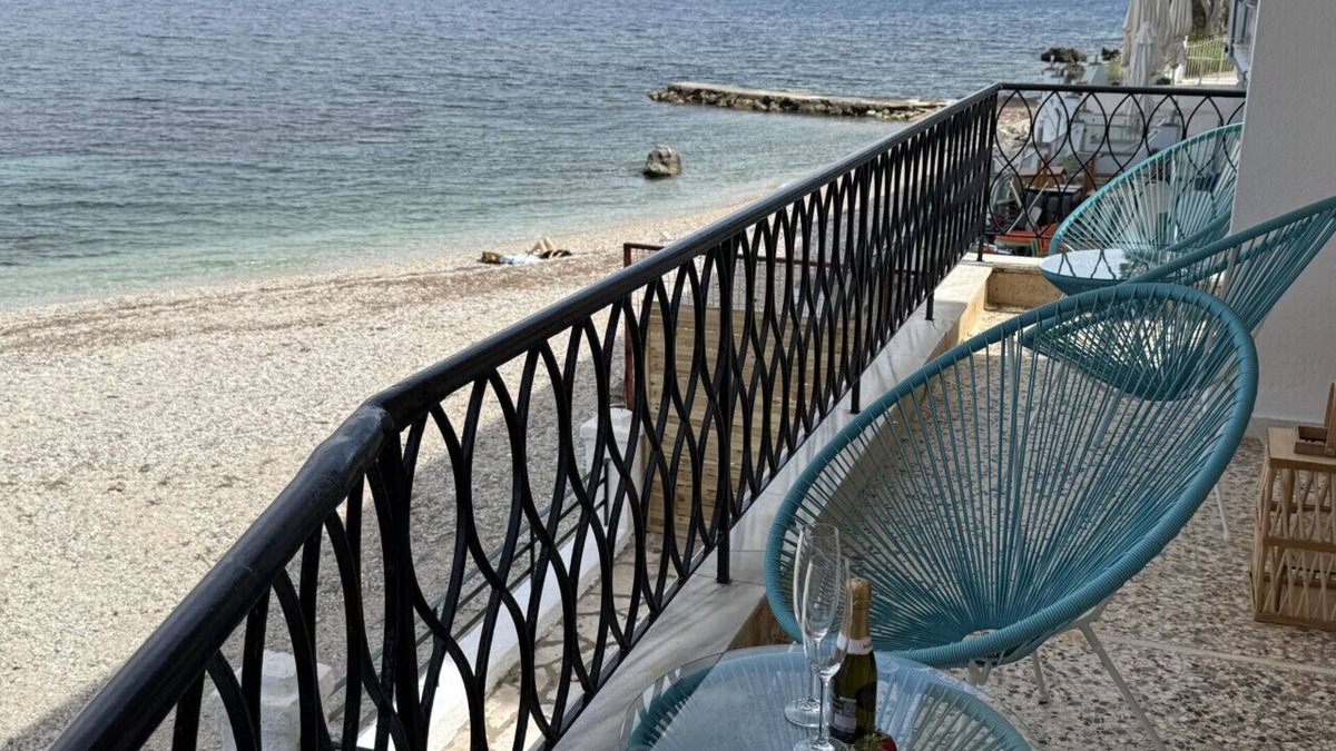 Benitses Apartment | Newly renovated luxury apartment on the beach with large sea front patio