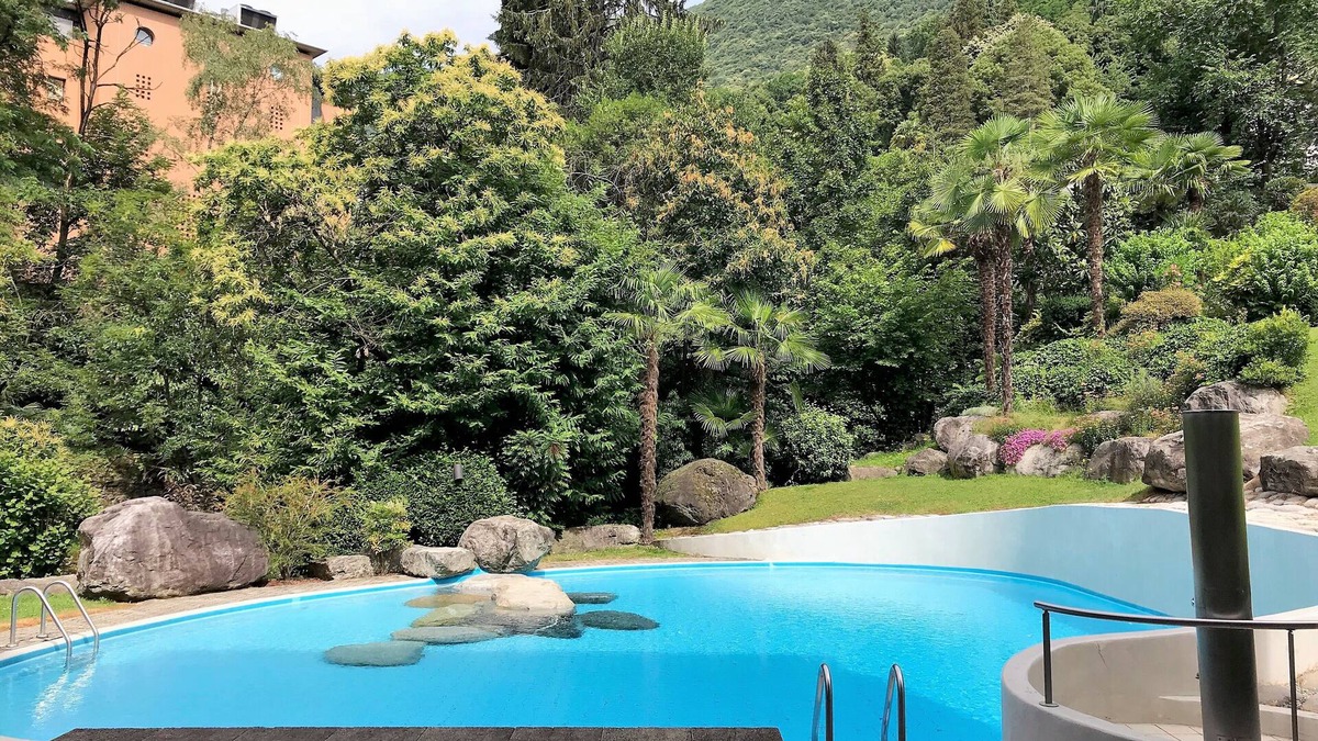 Minusio Apartment | Nice 4.5 room apartment with garden seating and outdoor swimming pool