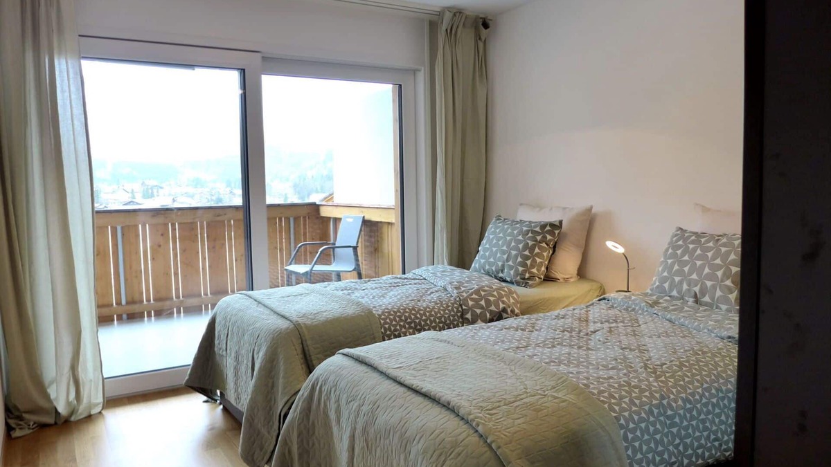 Blausee Apartment | Nice apartment for 4 people with WIFI, TV, balcony, pets allowed, panoramic view and parking