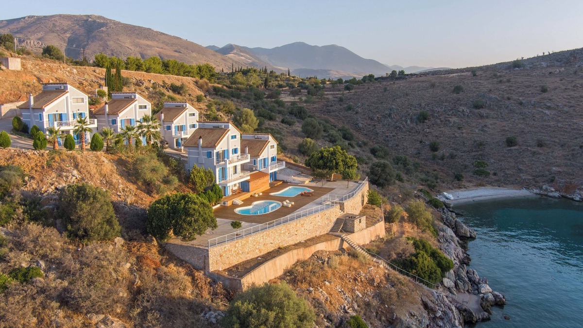 Galaxidi Villa | Nisaia is a villa with a small garden with barbeque next to the sea.