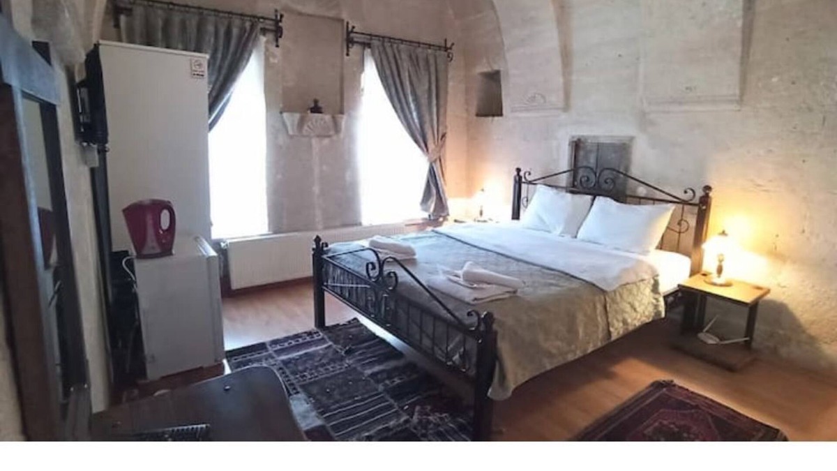 Goreme House | Nomads - Traditional Arch Stone room at the center