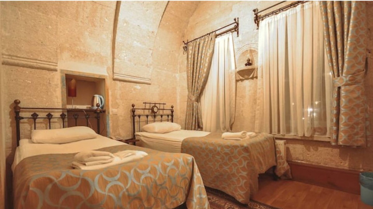 Goreme House | Nomads - Traditional Arch Stone room at the center