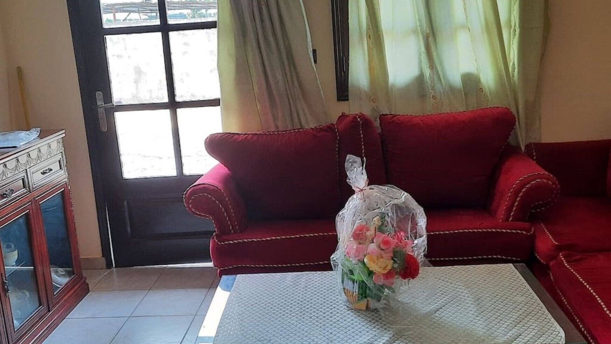 Libreville Apartment | Nzecy Appart. A studio with a velvety, air-conditioned living room.