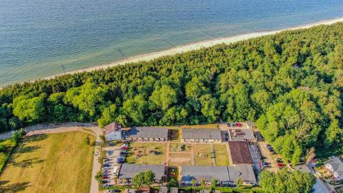 Sarbinowo Resort | Ośrodek rodzinny "Pod Wydmami" PRZY PLAŻY , PLAC ZABAW , ROWERY