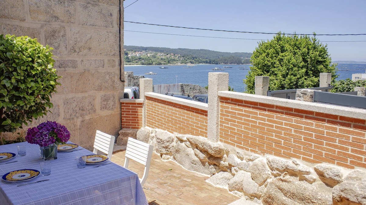 Cangas House | O Faro da Garita