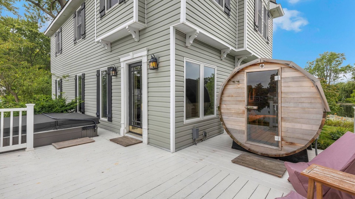 Wolverine Lake House | Oak Island: Waterfront Bliss with Hot Tub and Sandy Beach