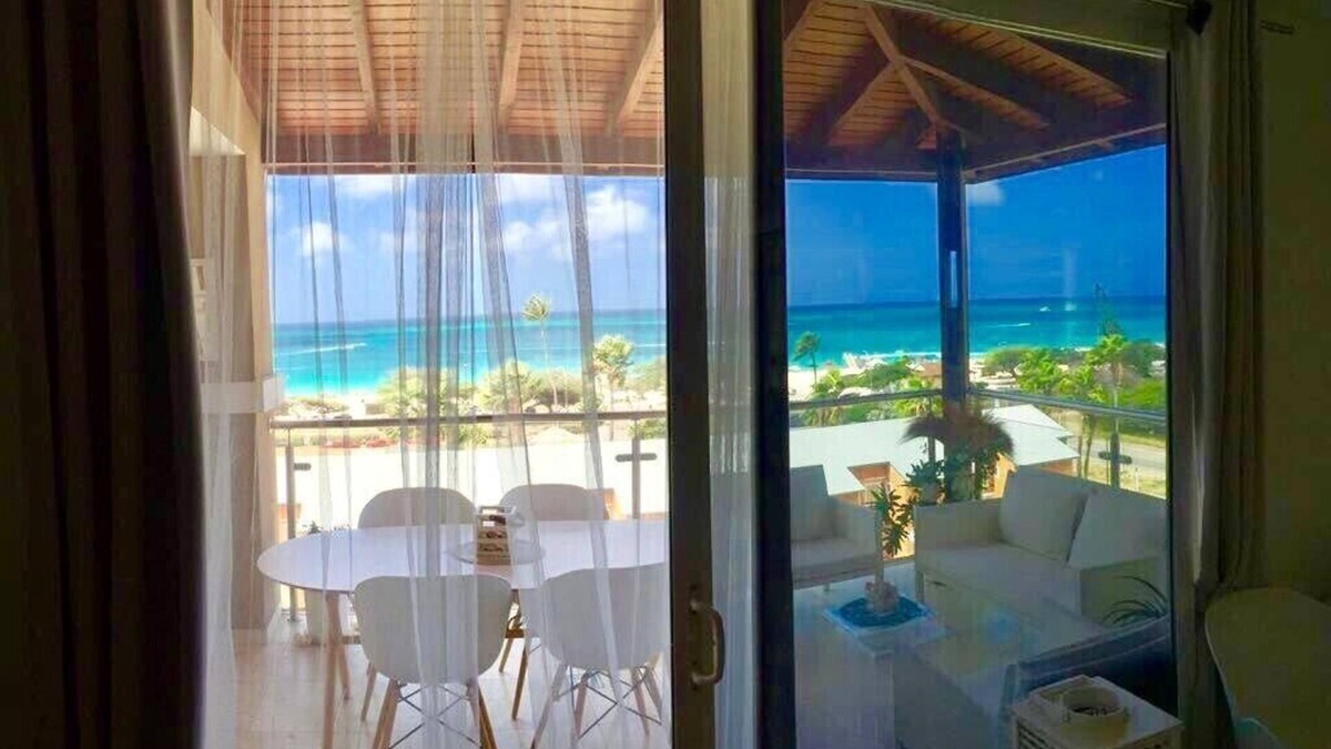 Oranjestad-West Apartment | Oasis Condominium ,Spectacular Sea view Big studio penthouse, ocean front,wifi,