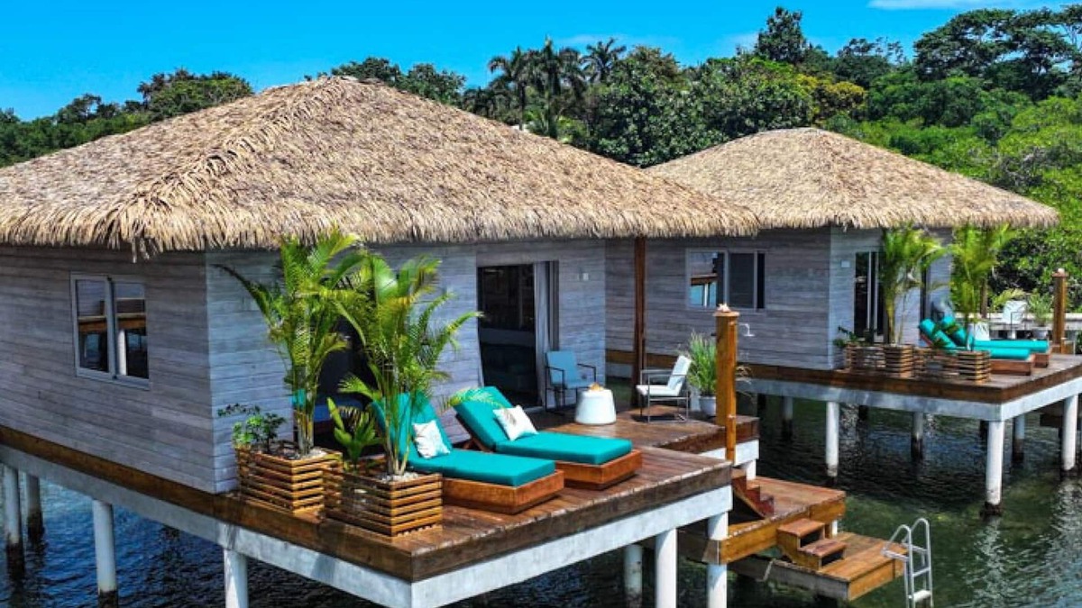 Isla Solarte House | Ocean Light Over Water Bungalow, Bedroom, King Bed, Living Room, Kitchenette