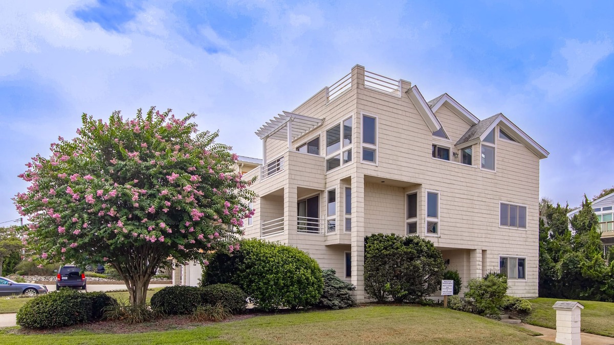 Croatan Beach House | Ocean-view home that is within a 2 minute walk to the beach w/rooftop deck
