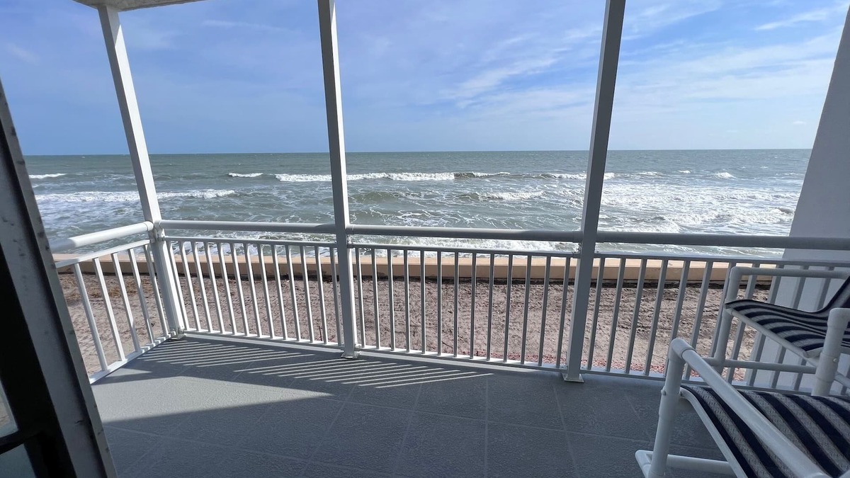 South Patrick Shores Condo | OCEANFRONT Condo! 2nd floor balcony 30' from ocean. 2 King bed, 2 full bath.