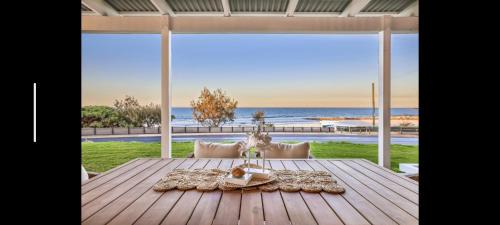 Burnett Heads House | OceanMist Holiday Home - beachfront property!