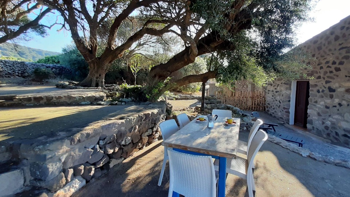 Sant'Antioco Cottage | Old and cozy typical stone house with terrace under the olive trees