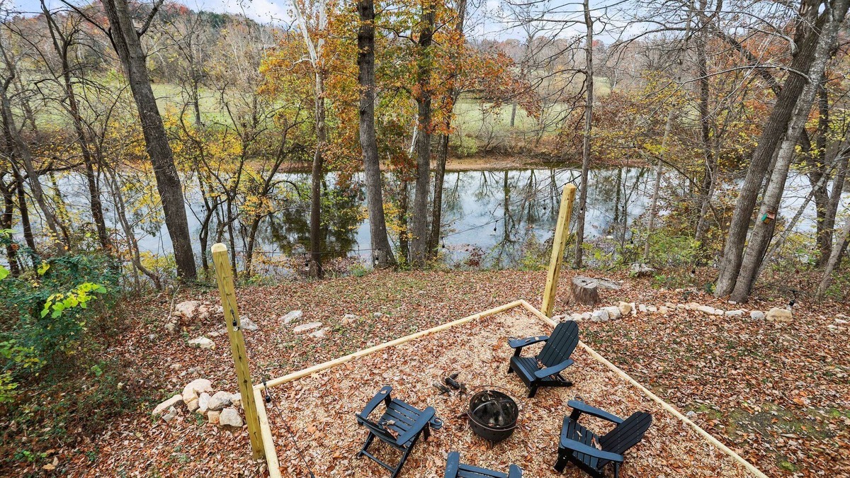 Fishers Hill House | On the river ~ hot tub ~ serene river views ~ fire pit
