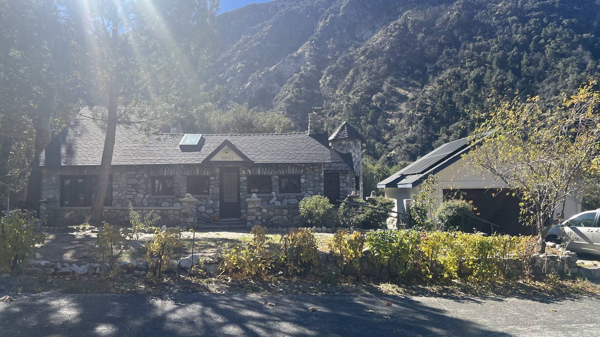 Mentone Cottage | One bedroom 100yr old stone cottage in California National Forest.