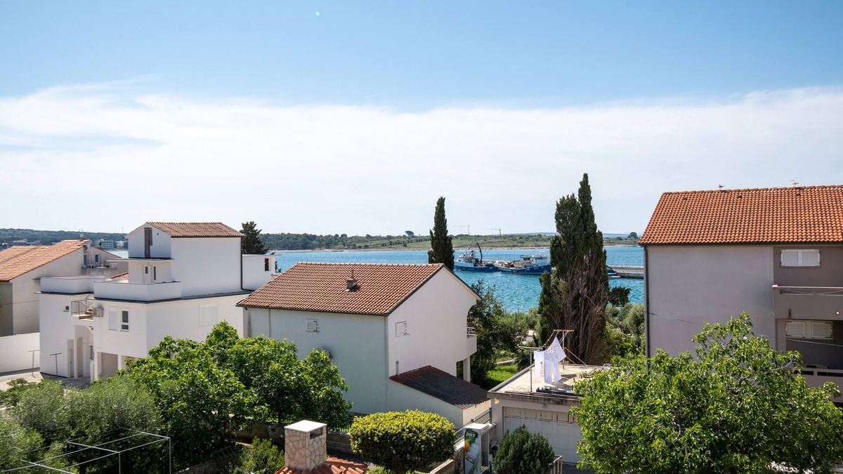Novalja Apartment | One bedroom apartment with balcony and sea view Novalja, Pag (A-6317-d)