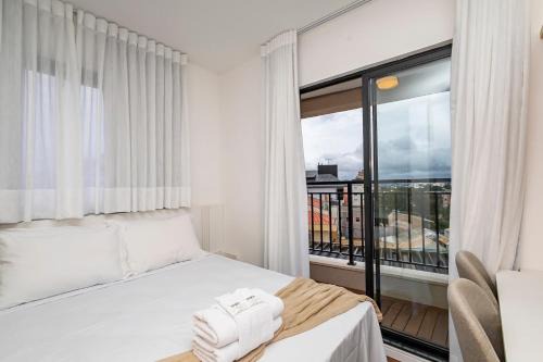Novo Mundo Apartment | One House