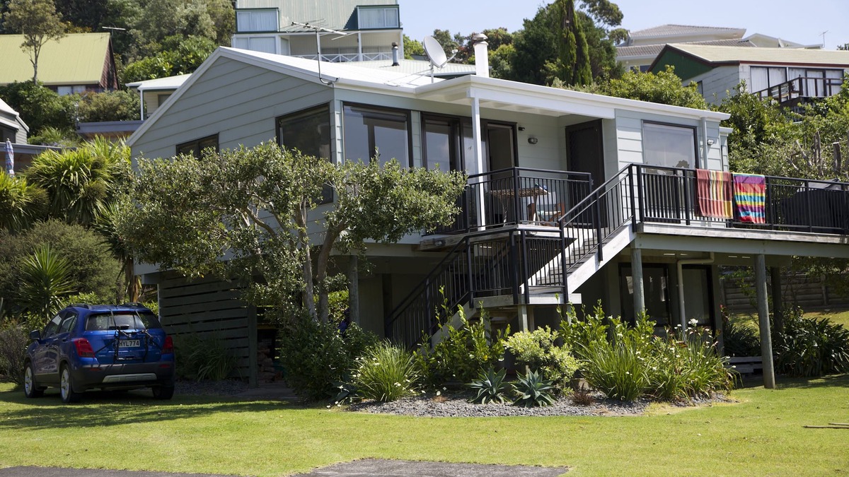 Onemana House | ONEMANA. Premium location. Walk across the road to the beach.