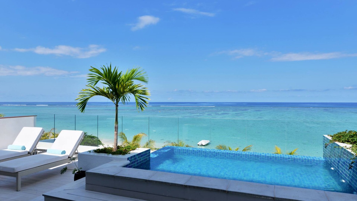 Wolmar Apartment | OPEN SKY penthouse | Cap Ouest, Wolmar | Feet in the water | Cleaning & cooking