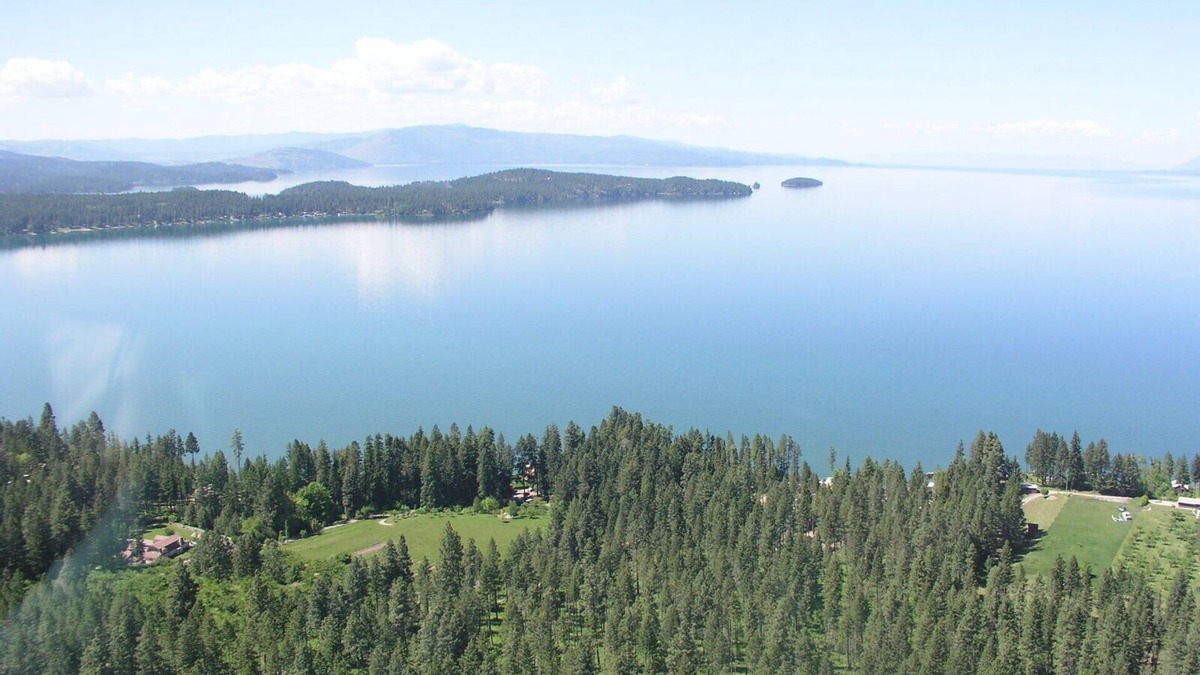 Finley Point House | Orchards & old growth forest surround this Finley Point Home.