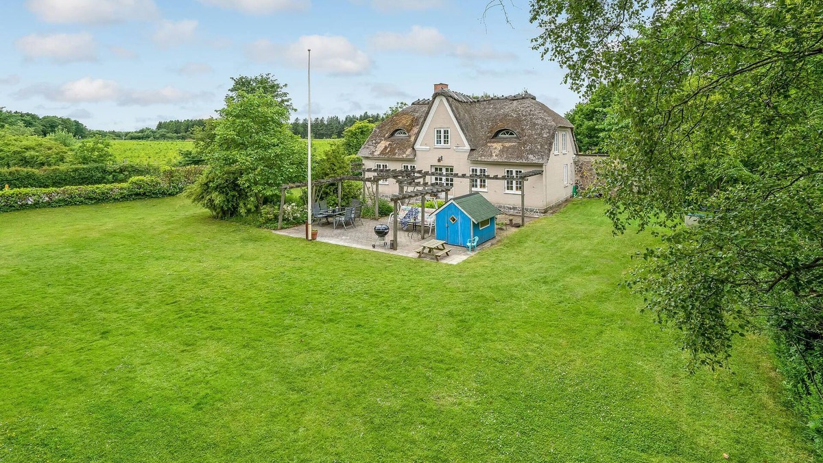 Krusaa House | Outside Krusau welcomes you this beautiful thatched house.