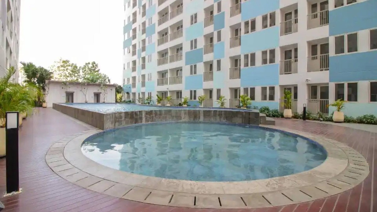 Karawang Hotel | OYO 93386 Apartemen Grand Sentraland by Mira