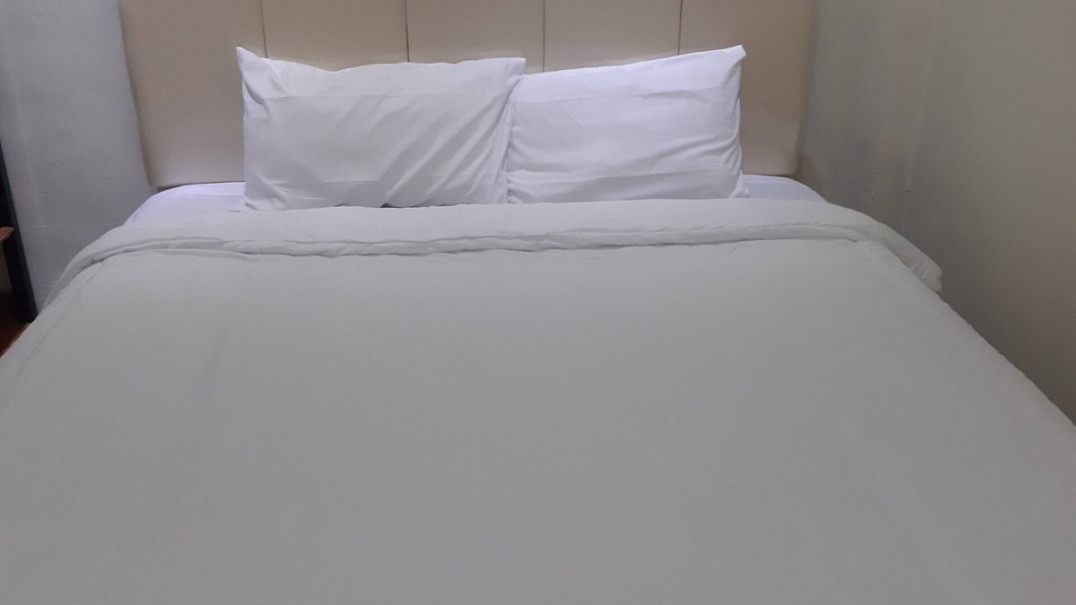 Sei Pinang Hotel | OYO 93521 Wisma Flamboyan NearTaman Makam Pahlawan