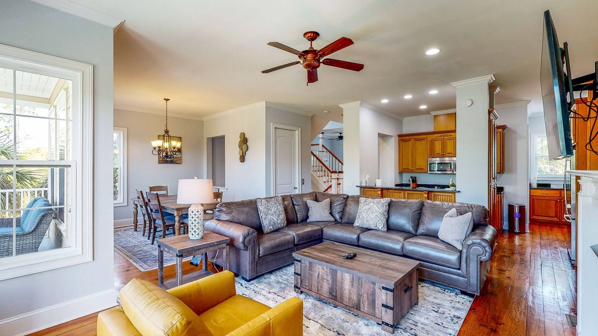 St. Marys House | Palm-lined home with dock access, firepit & inviting balconies