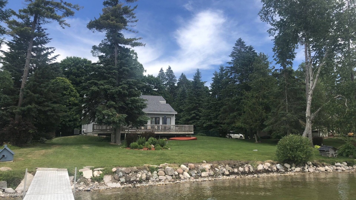 Brutus House | Palmer's Burt Lake Cottage - Private Dock! Waterfront!