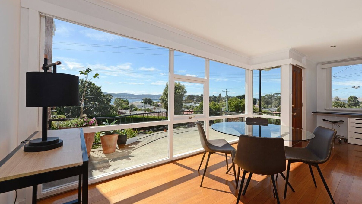 Sandy Bay Apartment | Panoramic water views, sunny and private - walk to beach, cafes and shops