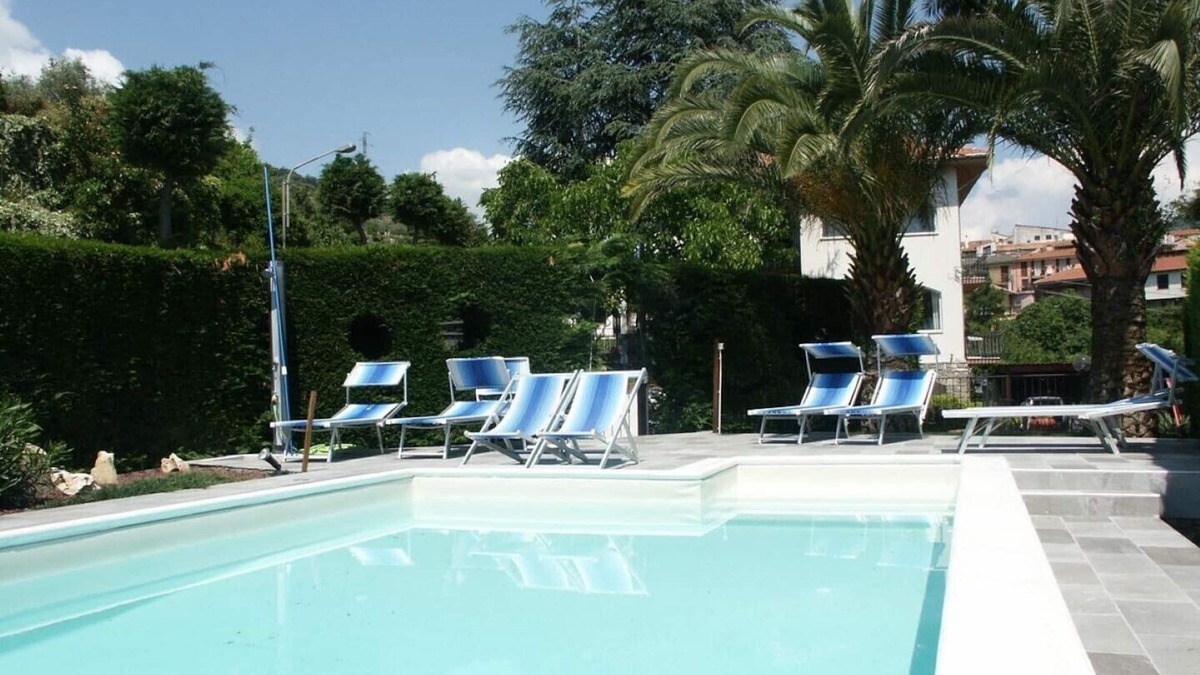 Strada Nazionale Sud House | Part of a villa with pool.