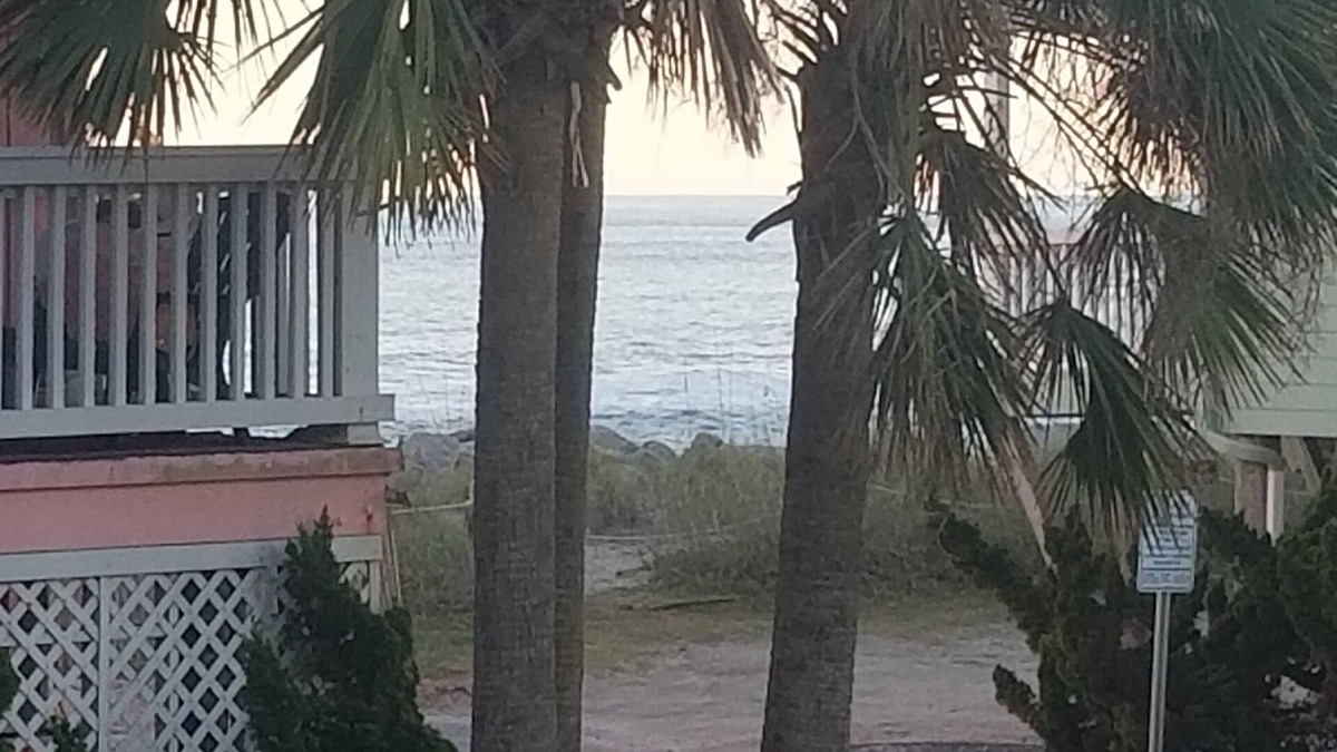 North Carolina Coast Condo | Partial ocean view. 6 min walk to beach. 1.5 baths: great beds, linens inc.