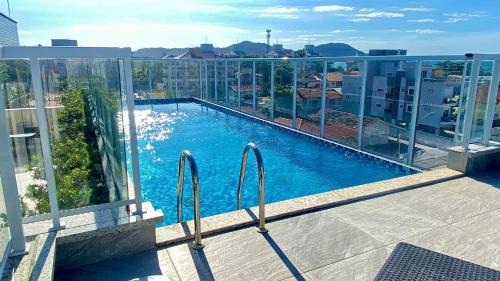 Ingleses Sul Apartment | Passos da praia c/piscina apto iluminado e novo