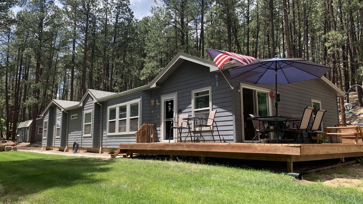 Forest Lakes House | Peace and privacy await among the towering Pine Trees.
