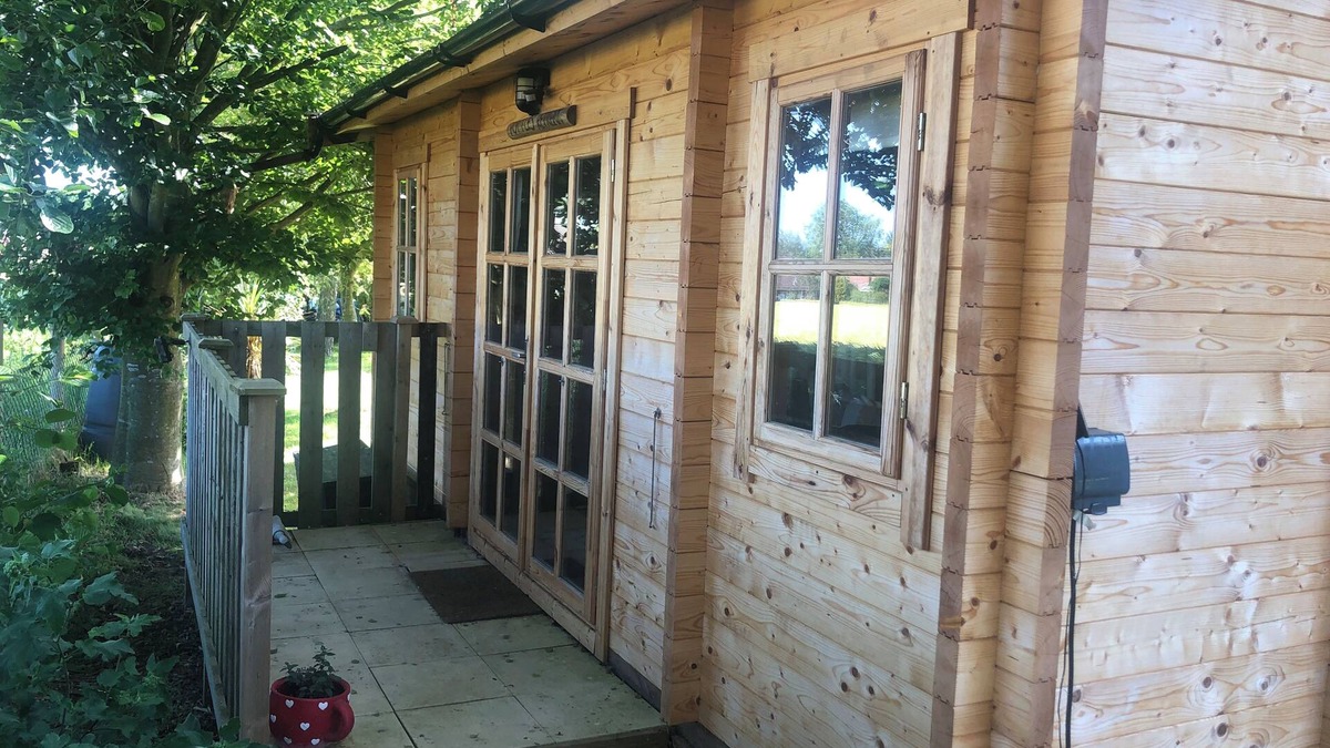 Surlingham Cabin | Peaceful, cosy log cabin, Norfolk Broads village