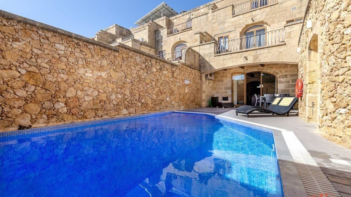 Ggantija Villa | Peaceful Farmhouse Retreat with Pool & Sun Lounger