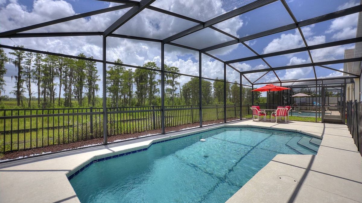 Sunset Ridge House | Peaceful Paradise Pool Home with King suite 10 minutes to Disney World